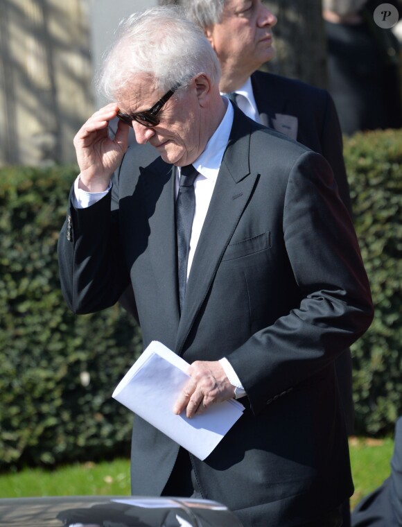 André Dussollier lors de l'inhumation d'Alain Resnais au cimetière du Montparnasse à Paris le 10 mars 2014