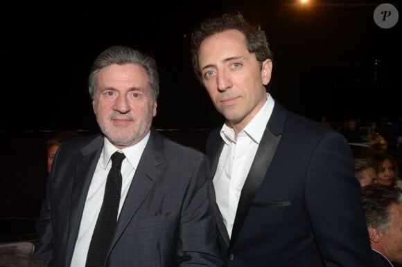 Exclusif - Daniel Auteuil et Gad Elmaleh lors de la 9e cérémonie des Globes de Cristal au Lido à Paris, le 10 mars 2014.