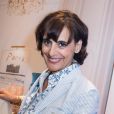 Inès de La Fressange, créatrice chic et tout sourire pour le lancement de sa collection pour Uniqlo. Paris, le 12 mars 2014.