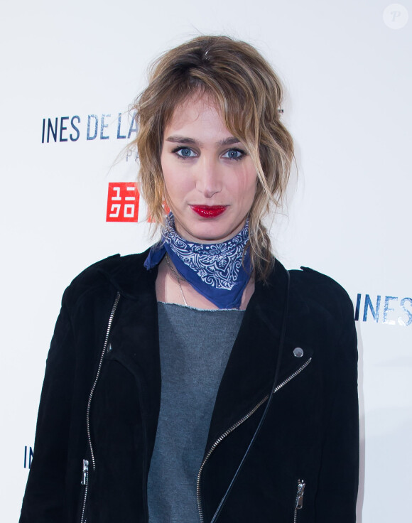 Pauline Lefèvre fête le lancement de la collection Inès de la Fressange Paris pour Uniqlo dans la boutique de la marque, à Opéra. Paris, le 12 mars 2014.