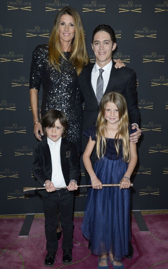 Sophie Thalmann, son mari Christophe Soumillon et leurs enfants Charlie et Mika lors de la 65ème édition des Cravaches d'Or au Théâtre des Champs-Elysées à Paris, le 14 mars 2014.