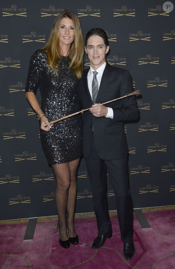 Sophie Thalmann et son mari Christophe Soumillon lors de la 65ème édition des Cravaches d'Or au Théâtre des Champs-Elysées à Paris, le 14 mars 2014.