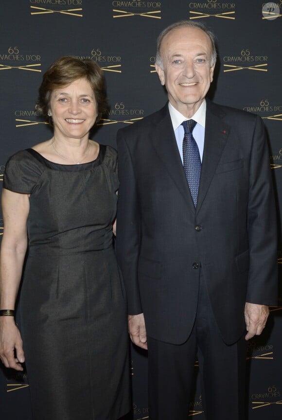 Bertrand Bélinguier, Président de France Galop, et sa femme lors de la 65ème édition des Cravaches d'Or au Théâtre des Champs-Elysées à Paris, le 14 mars 2014.