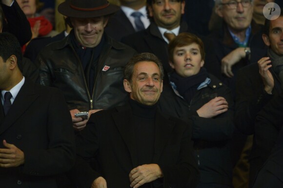 Nicolas Sarkozy lors du match entre le Paris Saint-Germain et Saint-Etienne au Parc des Princes à Paris le 16 mars 2014
