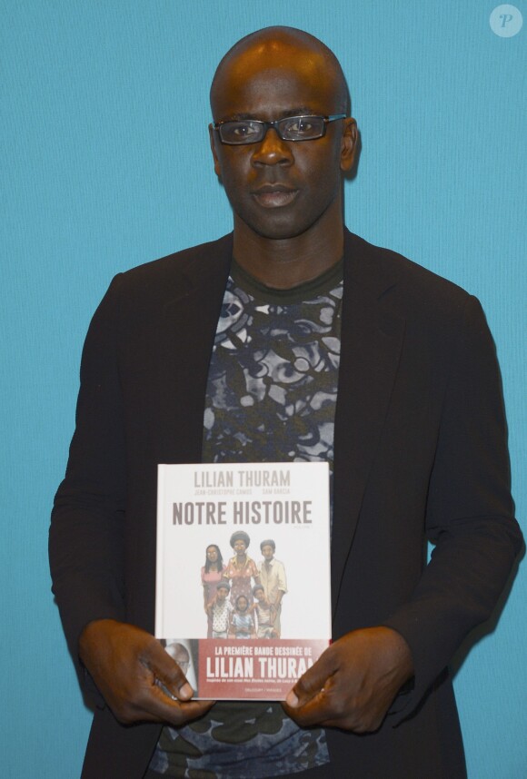 L'ex-footballeur Lilian Thuram à la 34e édition du Salon du Livre à Paris, Porte de Versailles, le 21 mars 2014.