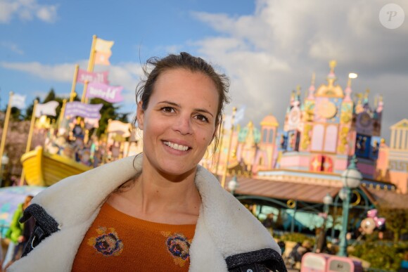 Laure Manaudou au parc Disneyland Paris, fête le 50e anniversaire de l'attraction It's a small world.