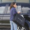 Mila Kunis, enceinte de son premier enfant, fait du shopping à Beverly Hills, le 26 mars 2014