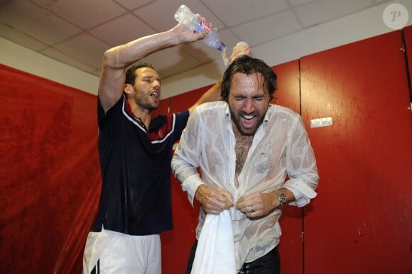 L'équipe de France de Coupe Davis (Julien Benneteau, Jo-Wilfried Tsonga, Gaël Monfils et Michaël Llodra) célèbre sa victoire en quart de finale contre l'Allemagne à Nancy le 6 avril 2014.