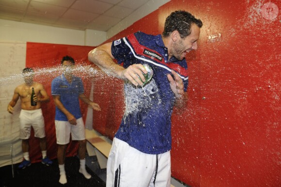 L'équipe de France de Coupe Davis (Julien Benneteau, Jo-Wilfried Tsonga, Gaël Monfils et Michaël Llodra) célèbre sa victoire en quart de finale contre l'Allemagne à Nancy le 6 avril 2014.