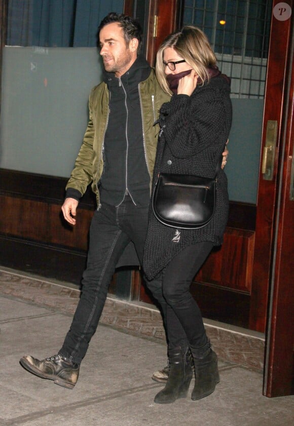Jennifer Aniston et son fiancé Justin Theroux à la sortie du restaurant "Locande Verde" à New York, le 11 mars 2014