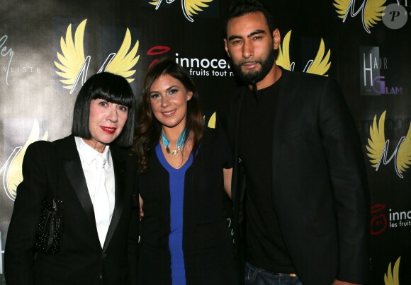 Chantal Thomass, Marion Bartoli et le rappeur La Fouine à la soirée de lancement de la marque "Wingista" de Marion Bartoli au VIP Room à Paris, le 9 avril 2014. L'ex tennis woman s'est lancée dans la création d'accessoires pour chaussures, une collection d'ailes baptisée Wingista.