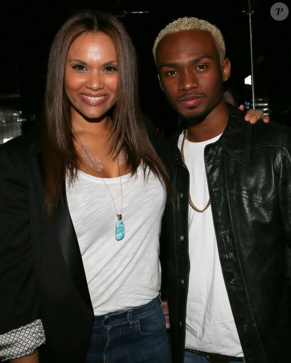 Angel Chow-Toun et le chanteur Krys à la soirée de lancement de la marque de Marion Bartoli au VIP Room à Paris, le 9 avril 2014. L'ex tennis woman s'est lancée dans la création d'accessoires pour chaussures, une collection d'ailes baptisée Wingista.