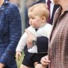 Le prince George de Cambridge au moment du départ du prince William et Kate Middleton de Nouvelle-Zélande, le 16 avril 2014