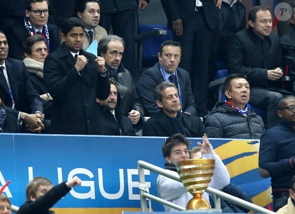 Nasser Al-Khelaïfi et Nicolas Sarkozy lors de la finale de football de la Coupe de la Ligue, PSG - Lyon (2-1), au Stade de France à Paris le 19 avril 2014. 