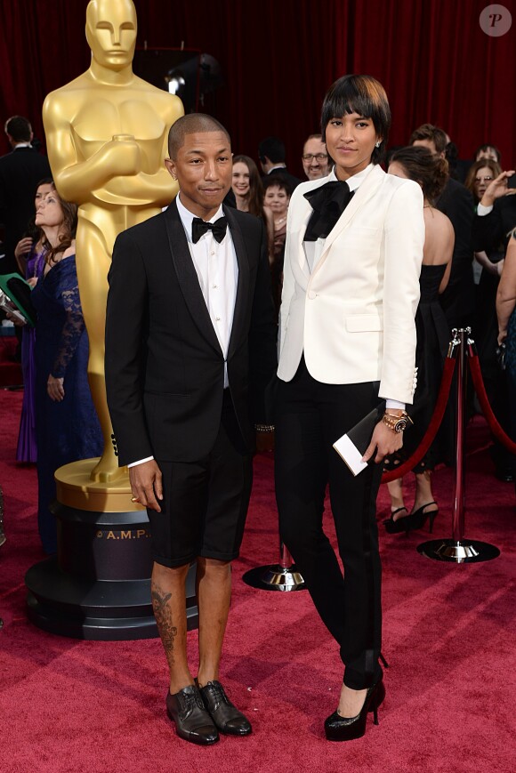 Pharrell Williams et sa femme Helen Lasichanh aux Oscars. Hollywood, le 2 mars 2014.