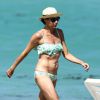 Minnie Driver profite de la piscine pendant ses vacances à Miami, le 10 avril 2014. Ce sont les mêmes photos qui ont déclenché une vague de critiques mesquines à l'égard du corps de l'actrice britannique de 44 ans.