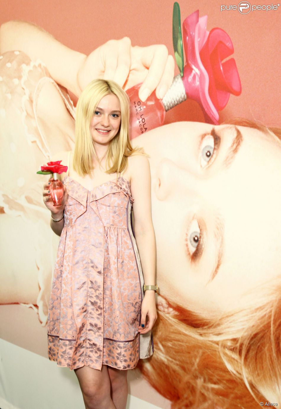 Dakota Fanning pour lancement du parfum &quot;Oh! Lola&quot; de Marc Jacobs, à Ne york le 14 septembre 2011.
