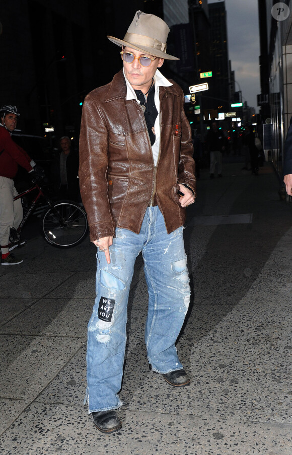 Johnny Depp près d'une librairie d'anciens et rares livres à New York, le 22 avril 2014.