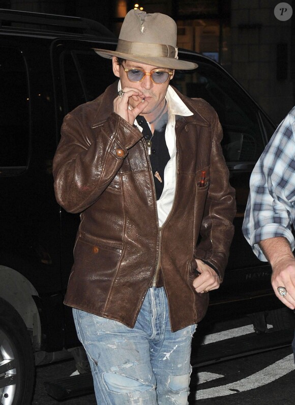 Johnny Depp près d'une librairie d'anciens et rares livres à New York, le 22 avril 2014.