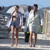 Exclusif - Dree Hemingway et son compagnon Phil Winser quittent une plage de Miami après quelques heures de détente. Le 23 avril 2014.