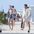  Exclusif - Dree Hemingway et son compagnon Phil Winser quittent une plage de Miami apr&egrave;s quelques heures de d&eacute;tente. Le 23 avril 2014. 