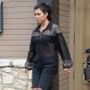 Kourtney Kardashian quitte le restaurant The Villa, après y avoir déjeuné avec ses soeurs Kim et Khloé. Calabasas, le 25 avril 2014.
