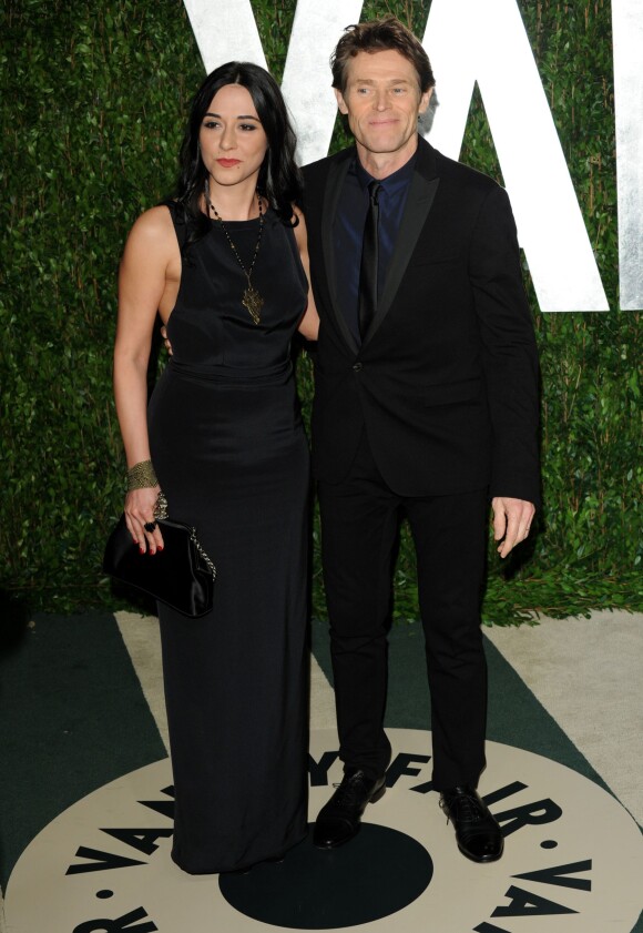 Giada Colagrande et Willem Dafoe lors la soirée post-Oscar du magazine Vanity Fair. Los Angeles, février 2012.