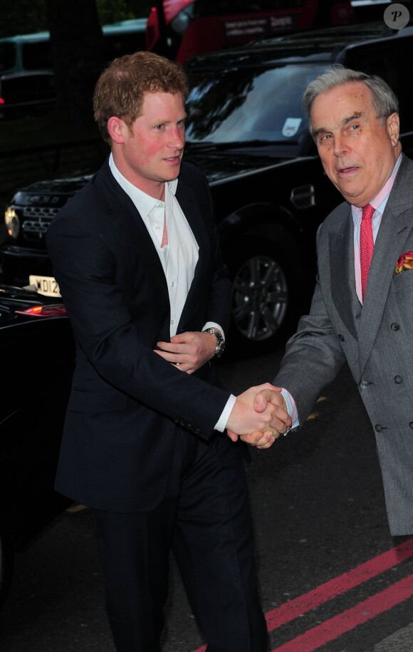 Le prince Harry présidait le 7 mai 2014 à l'Hôtel Dorchester, à Londres, la soirée Sentebale Summer Party avec son ami et associé dans la fondation Sentebale, le prince Seeiso du Lesotho.