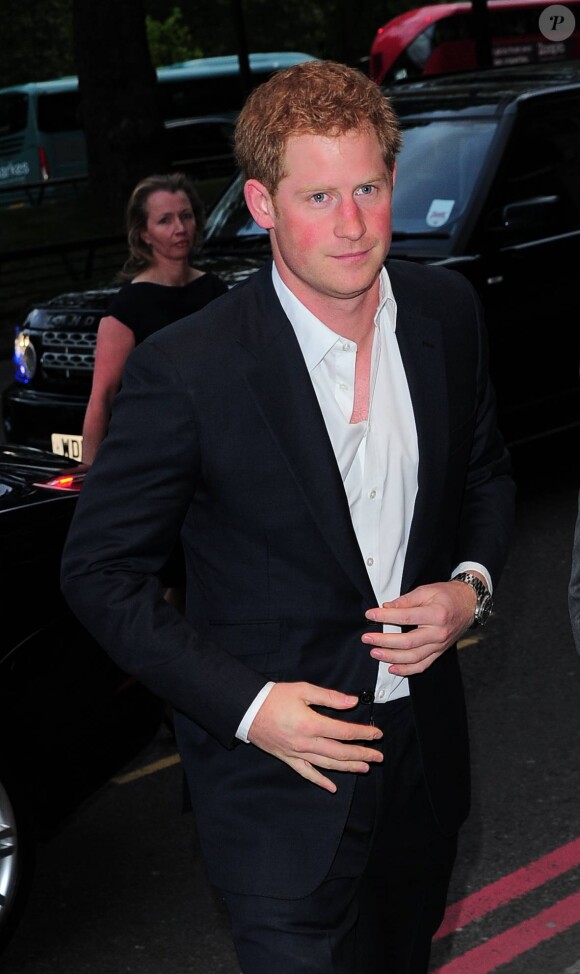 Le prince Harry présidait le 7 mai 2014 à l'Hôtel Dorchester, à Londres, la soirée Sentebale Summer Party avec son ami et associé dans la fondation Sentebale, le prince Seeiso du Lesotho.