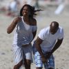 Kelly Rowland et son fiancé Tim Witherspoon s'amusent sur une plage de Miami, le 16 février 2014.