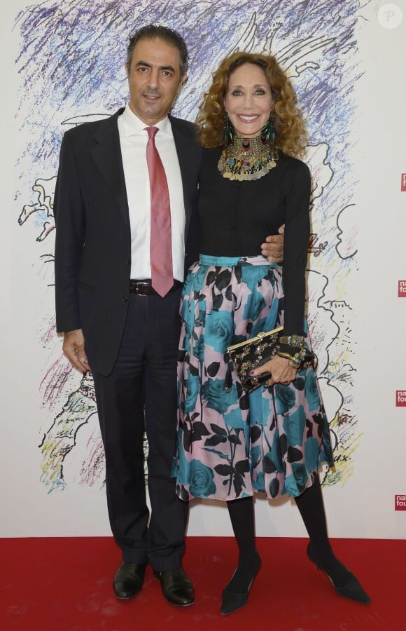 L'idole Marisa Berenson et son compagnon Jean-Michel Simonian - Dîner de charité pour la Fondation Naked Heart et en l'honneur de Monumenta, "L'étrange cité", au Grand Palais, à Paris le 13 mai 2014.