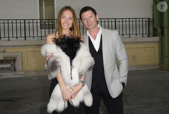 Denis Alexandrov et sa compagne Anastasia - Dîner de charité pour la Fondation Naked Heart et en l'honneur de Monumenta, "L'étrange cité", au Grand Palais, à Paris le 13 mai 2014.