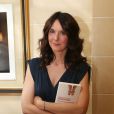 Emmanuelle Cosso-Merad donne un showcase et une séance de dédicaces pour la sortie du livre "J'ai rencontré quelqu'un", à l'hôtel Belmont dans le 16e arrondissement à Paris, le 13 mai 2014.