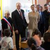 Le prince Albert II et la princesse Charlene de Monaco ont inauguré l'école Nelson Mandela lors de leur visite à Carlat, dans le Cantal, le 15 mai 2014 dans le cadre du centenaire de la cession du rocher de Carlat au prince Albert Ier. Après Carlat, le couple princier a visité Calvinet.