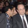 Jamel Debbouze et François Hollande dans le public lors de la finale du 4e Trophée d'Impro de la Fondation Culture et Diversité et de la Compagnie Déclic Théâtre, le 19 mai 2014 au Théâtre Comedia, à Paris.