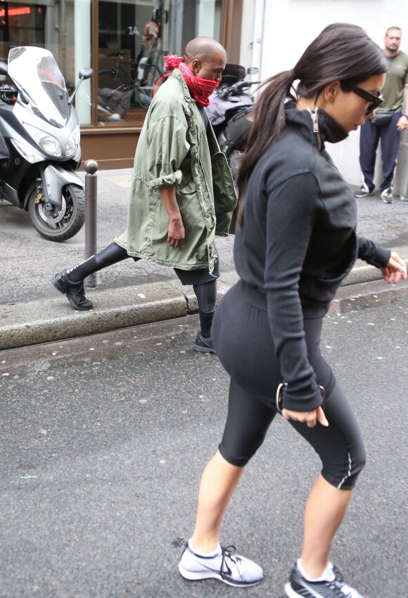 Les futurs mariés Kim Kardashian et Kanye West quittent la salle de gym à Paris le 21 mai 2014.
