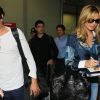 Heidi Klum, relax, et son nouveau compagnon Vito Schnabel arrivent à l'aéroport Nice pour assister au 67e festival de Cannes le 21 mai 2014.