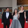 Kamel Abdeli, Heloise Godet et Zoe Bruneau - montée des marches du film Adieu au langage de Jean-Luc Godard (absent) lors du Festival de Cannes le 21 mai 2014