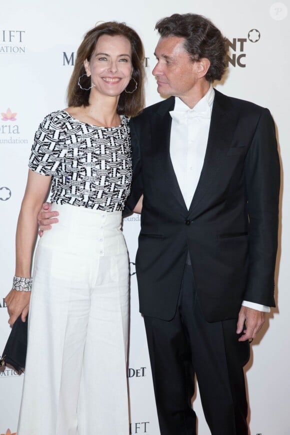 Carole Bouquet et son compagnon Philippe Sereys de Rothschild - Soirée "Global Gift Gala" dans le cadre du 67e Festival international du film de Cannes, le 16 mai 2014