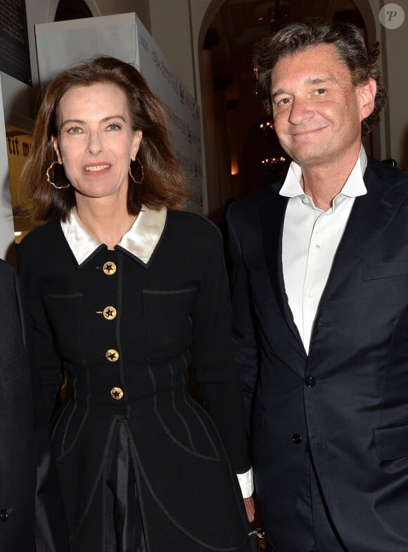Carole Bouquet et son compagnon Philippe Sereys de Rothschild - Photocall de la 4ème édition du Gala " Planet Finance" au Carlton dans le cadre du 67e Festival international du film de Cannes le 15 mai 2014