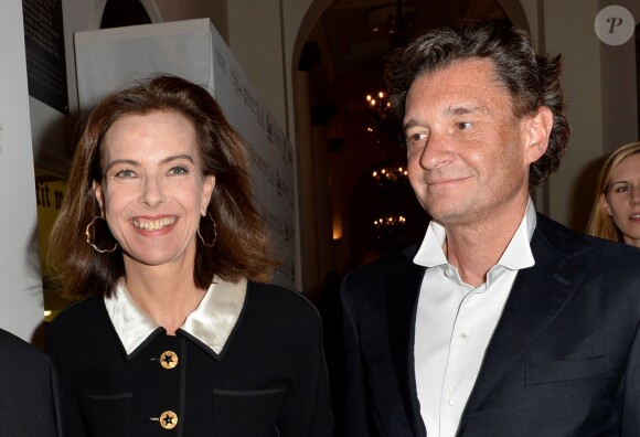 Carole Bouquet et son compagnon Philippe Sereys de Rothschild - Photocall de la 4ème édition du Gala "Planet Finance" au Carlton dans le cadre du 67e Festival international du film de Cannes le 15 mai 2014