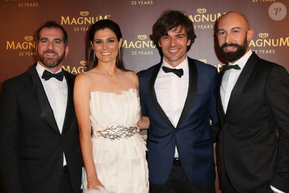 Valeria Solarino, Luca Argentero - Photocall de la soirée du 25ème anniversaire de Magnum à Cannes lors du 67ème festival de Cannes le 21 mai 2014.