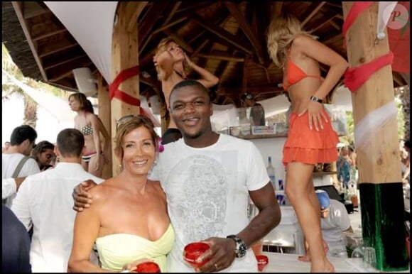 Marcel Desailly et sa femme Virginie au Nikki Beach à Saint-Tropez en juillet 2009.