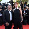 Perico Legasse et sa femme Natacha Polony lors de la montée des marches de la cérémonie de clôture du 67e Festival du film de Cannes le 24 mai 2014.