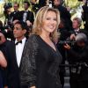 Natacha Amal (robe Christophe Guillarmé, bijoux Gil Neuhaus) - Montée des marches du film "Pour une poignée de dollars" pour la cérémonie de clôture du 67e Festival du film de Cannes le 24 mai 2014.