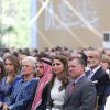 La reine Rania et le roi Abdullah II de Jordanie avec leur fils le prince Hussein et leur fille la princesse Iman le 25 mai 2014 à Amman lors de la Fête nationale.