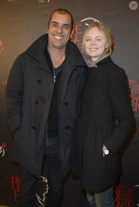 Cedric Pioline et sa compagne Oxana à la première de la comédie musicale "La Belle et la Bête" avec Vincent Niclo dans le rôle de la Bête au théâtre Mogador à Paris le 20 mars 2014.