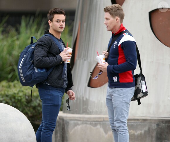 Exclusif – Le plongeur britannique Tom Daley et son chéri Dustin Lance Black à Houston, le 11 décembre 2013.
