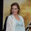 Jacqui Ainsley, enceinte de son 3e enfant (robe Tiffany Rose et châle Anna Sui) - Avant-première du film "Edge of Tomorrow" au BFI Imax à Londres le 28 mai 2014
