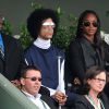 Le chanteur Prince assiste au match entre Rafael Nadal et Dusan Lajovic aux côtés de sa fiancée Damaris Lewis, lors des Internationaux de France de tennis de Roland-Garros à Paris, le 2 juin 2014.